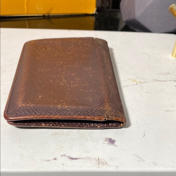 Authentic Louis Vuitton Taiga Bifold Wallet - Picture 8 of 10